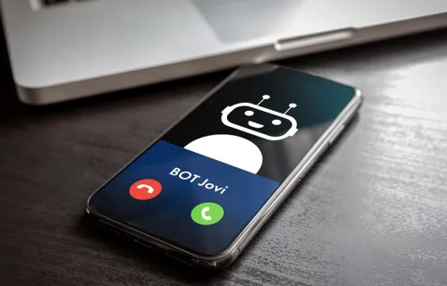 Chatbot on a mobile phone screen on a desk