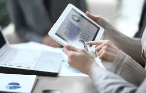 Business team using digital tablet