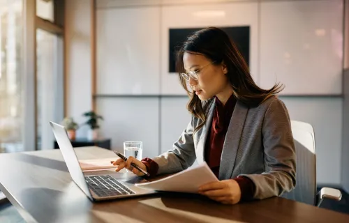 business woman analyzing the report