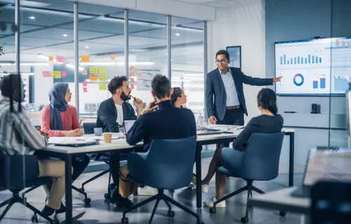 CGI AIOps Nova consultant presents to meeting room