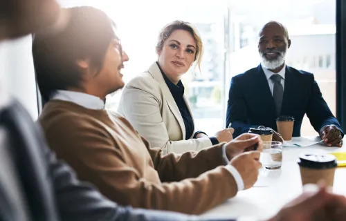 CGI consultants sat in meeting room