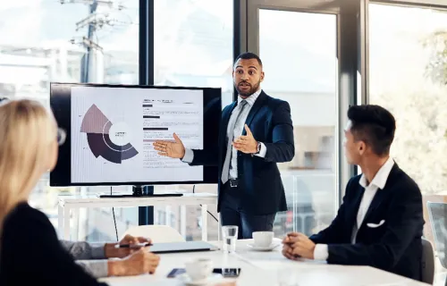 Consultant presenting service management analytics dashboard