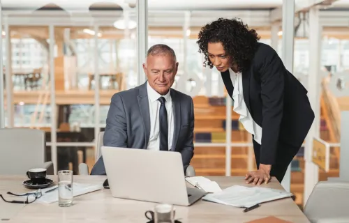 Consultants discussing CGI Invistion