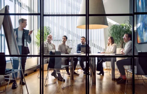 group of consultants in a meeting room