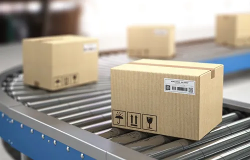 retail boxes on a supply chain conveyer belt