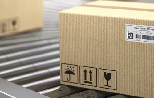 retail boxes on a supply chain conveyer belt