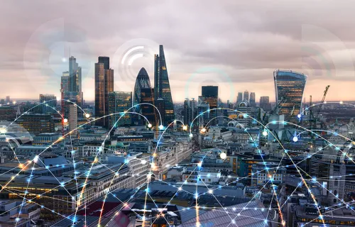 En storstadsvy där vita connector-streck symboliserar emerging tech 