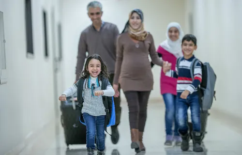 Refugee family in safety in airport