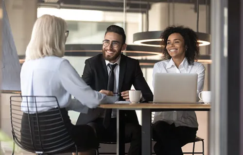 Three consultants meeting