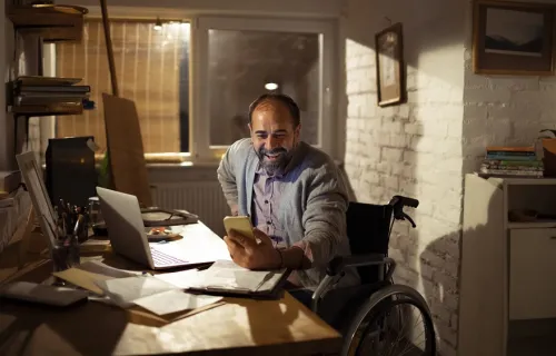 man in wheelchair interacting with his local government