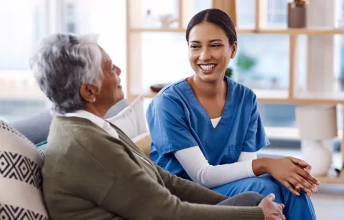 Healthcare professional talking to a patient 