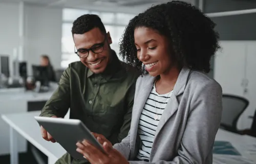 man and woman in office