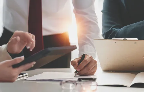 _people_working_together_with_a_tablet_device