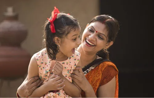 CGI india CSR - women with her daughter