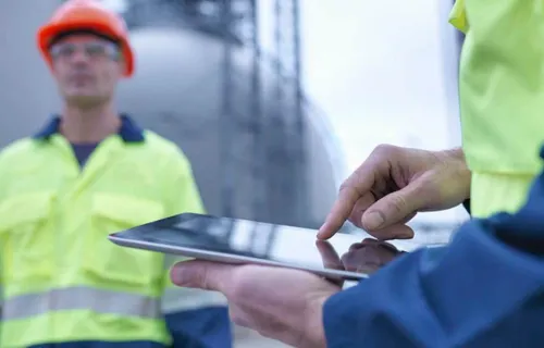 Worker using a tablet device
