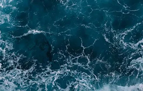Aerial shot of crashing waves