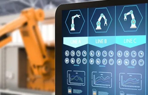 Digital screen showing robots completing an automated process on a factory floor.
