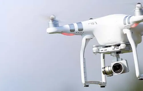 Drone flying through air