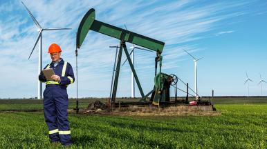 Man with tab - Oil and gas