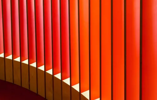Orange abstract lines on a building