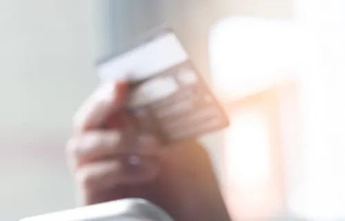 Buyer making a mobile purchase with a credit card