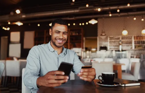 Person using banking app on mobile device