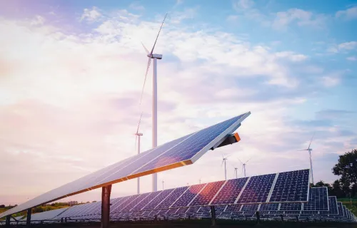 Energy farm with solar panels and wind turbines  