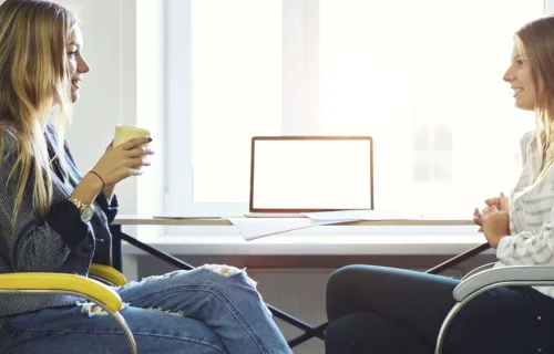 two women chatting