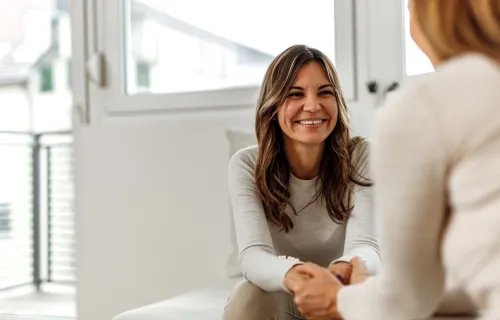 Woman in a conversation with a health care provider