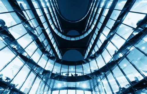 Upward view of inside lobby of an insurance skyscraper.jpg