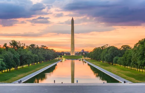 View of the Washington Monument and reflecting pool at dusk