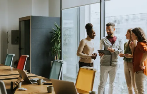 Young multi-ethnic team working in office