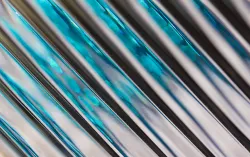 Manufacturing ecosystem with blue metallic data stream