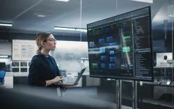 Engineer working on finding and fixing bugs in a product or program software code before the launch