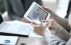 Business team using digital tablet