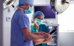 clinicians in operating theatre