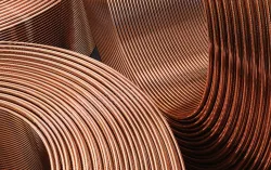 Close-up of coiled copper wire rolls