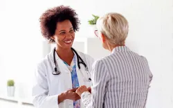 Doctor speaking to a patient