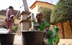 African Girls Fetching Water at the Borehole