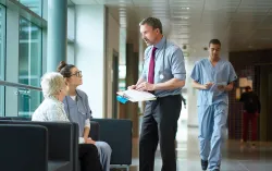 health-doctor-patient-hospital-corridorpsd