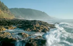 waves crashing on a rocky coastline