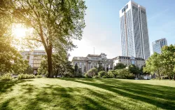 high rise building with greenery around