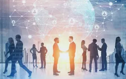 Business people shaking hands to signify partnership