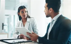 Man and women consulting on a project