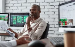 consultant holding a paper report