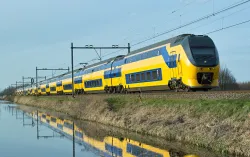 double decker train on railway tracks