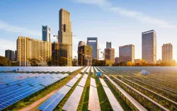 High rise buildings behind ground solar panels