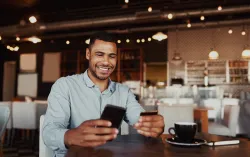 Person using banking app on mobile device