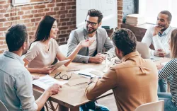 Professionals meeting around table