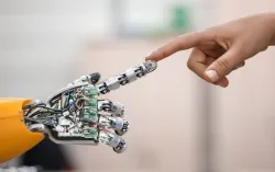 robotic hand connecting to human hand